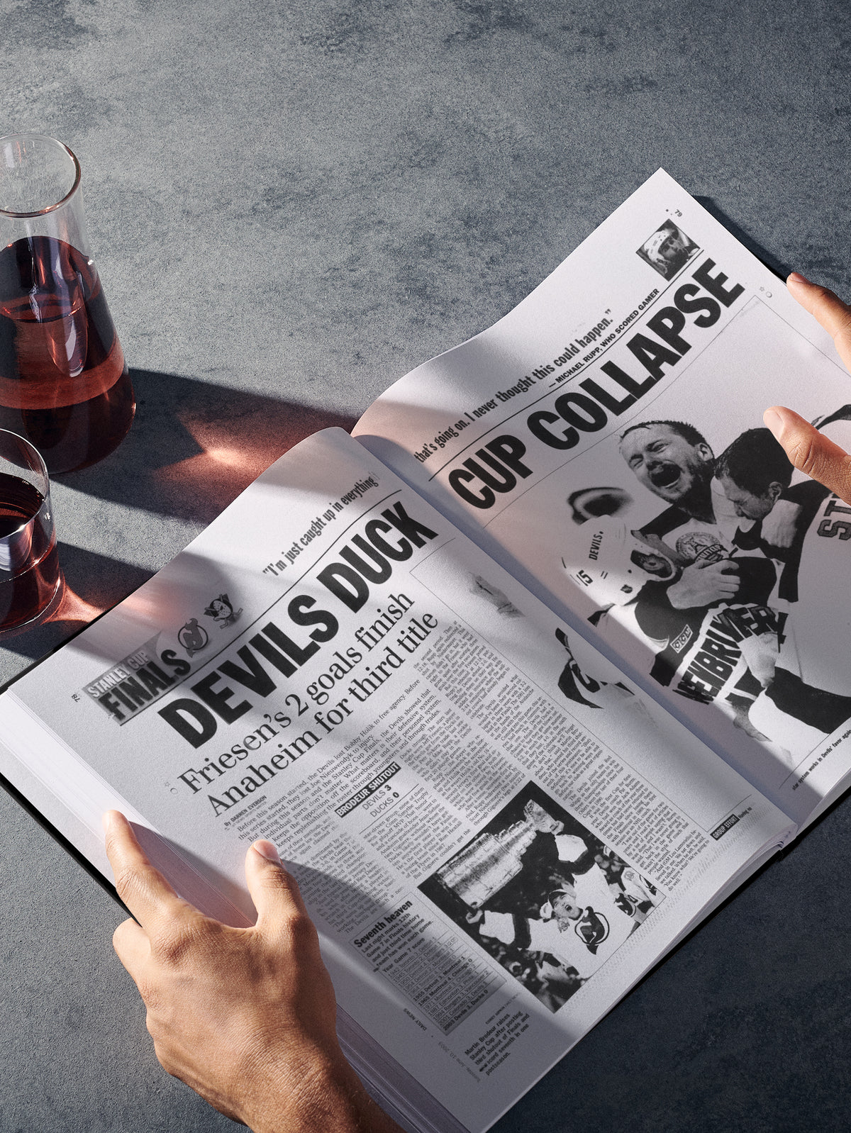Black and white image of a newspaper front page featuring New Jersey Devils hockey from Historic Newspapers' POD book.