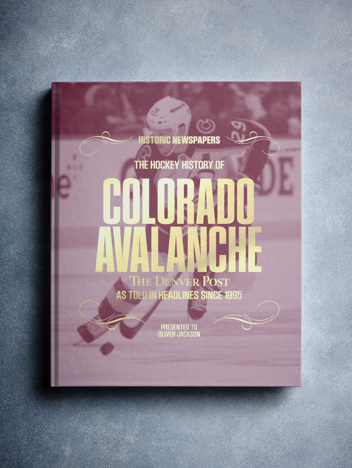 Colorado Avalanche hockey history book by Historic Newspapers, Denver Post edition, featuring foil-embossed burgundy cover and pictorial design.