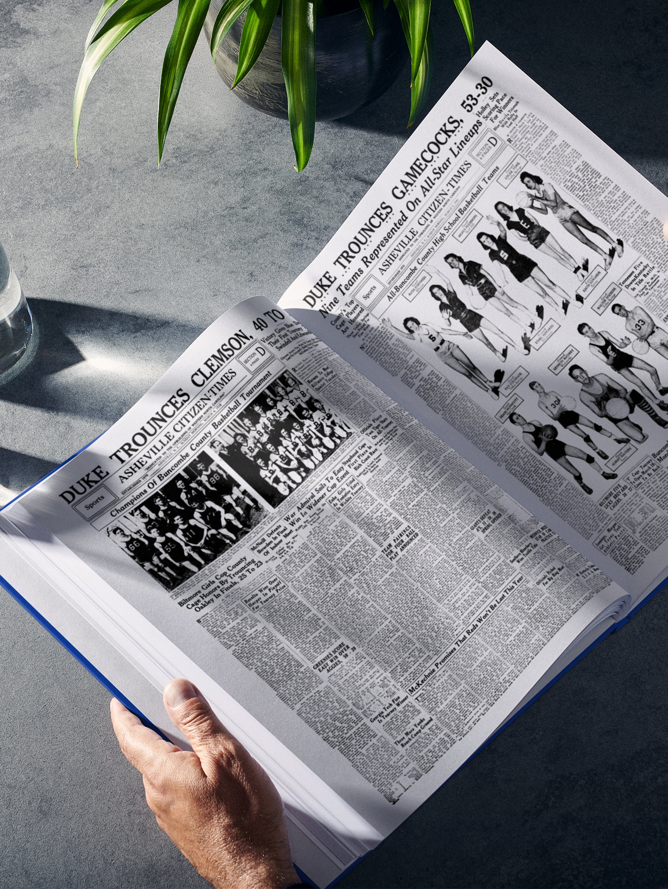 Open POD book titled "The College Basketball History of Duke Blue Devils" by Historic Newspapers showing a basketball-themed spread.