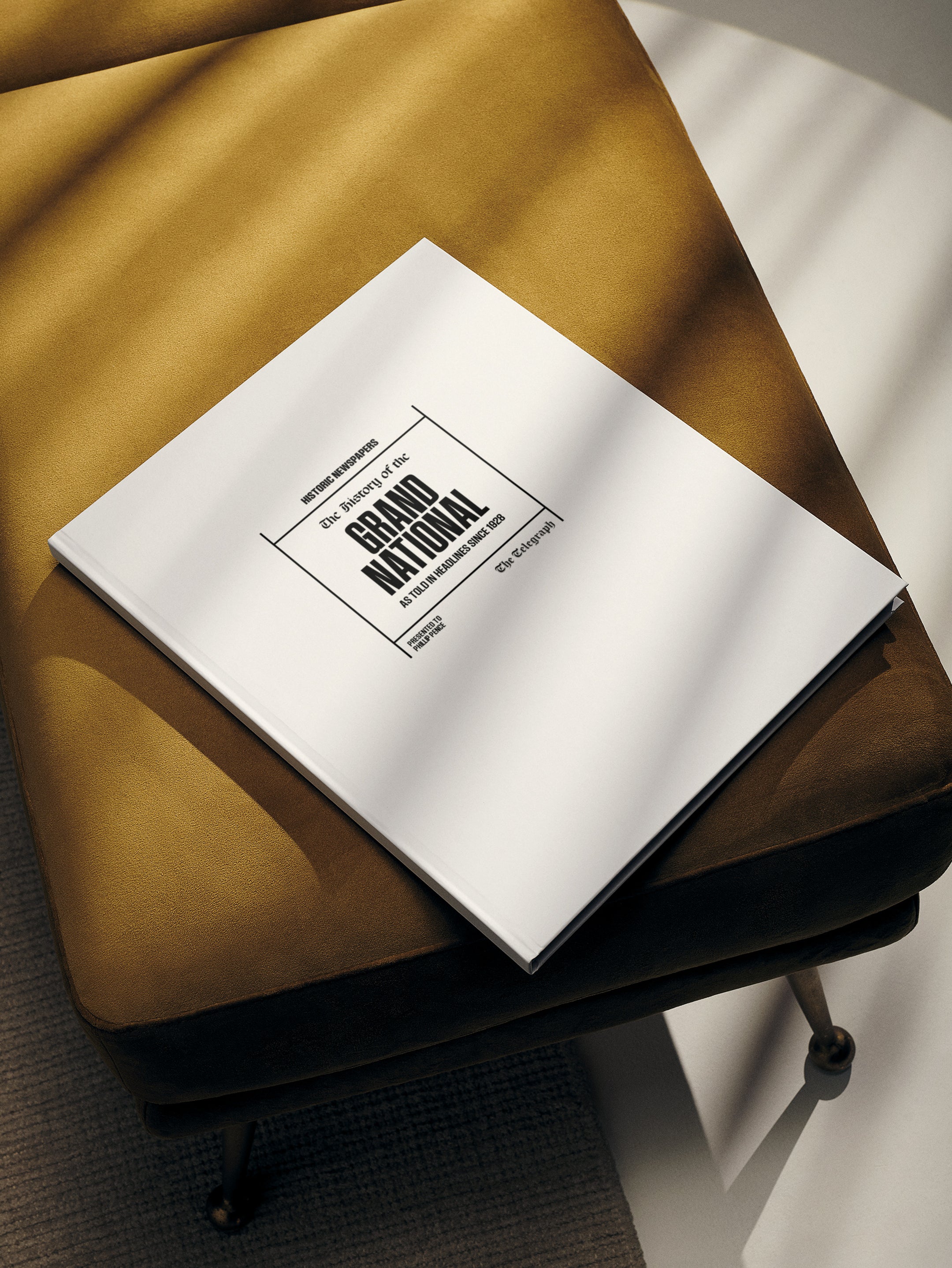 A POD book titled "The History of the Grand National" by Historic Newspapers, featuring a classic white cover with vintage newspaper design.