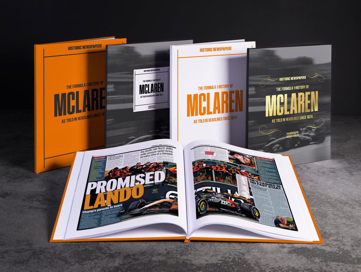 Foil cover of "The Formula 1 History of McLaren" POD book by Historic Newspapers, featuring McLaren racing team imagery.