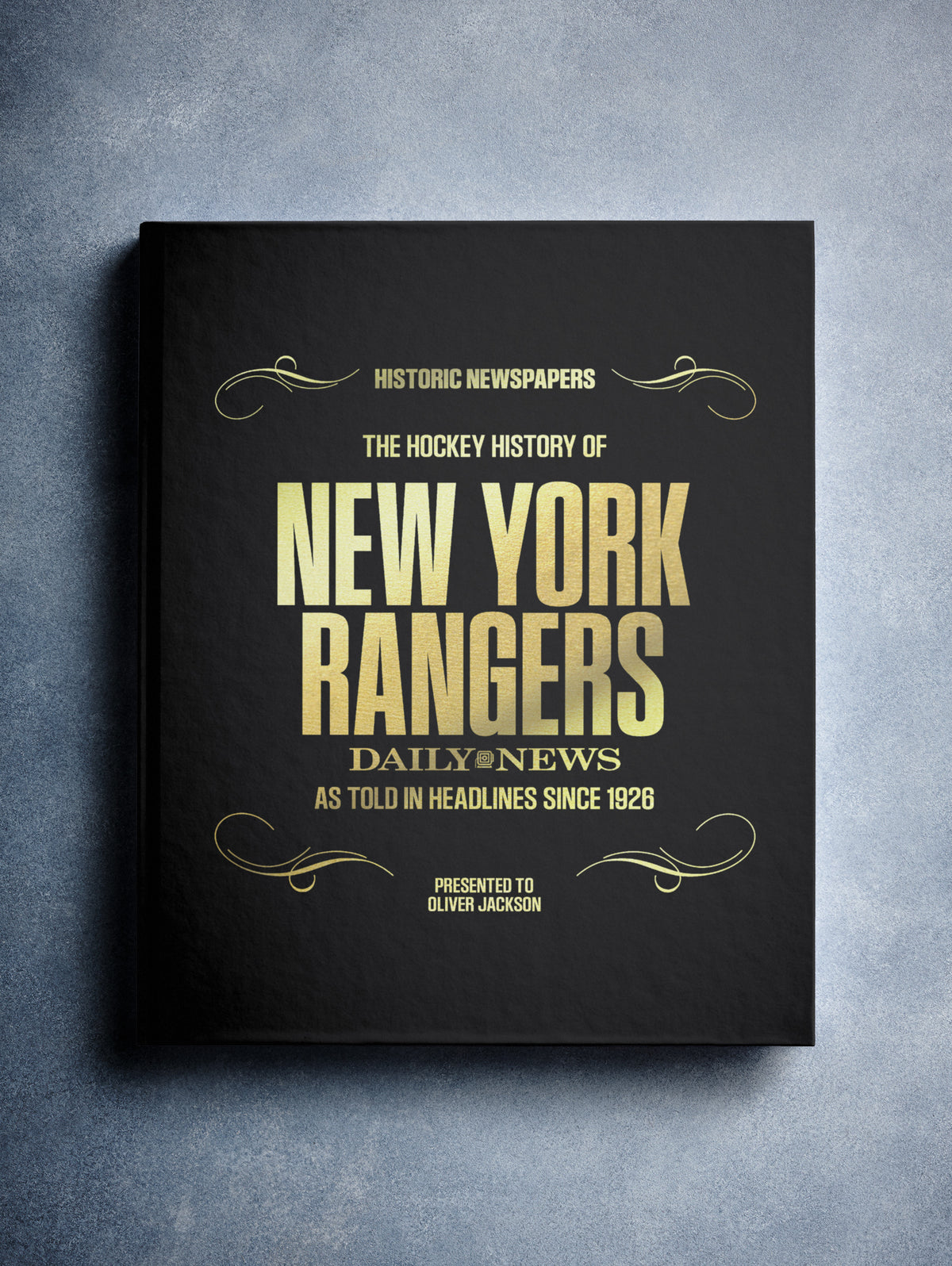Black foil-covered POD book titled "The Hockey History of New York Rangers" from Historic Newspapers, featuring a hockey newsstand cover.
