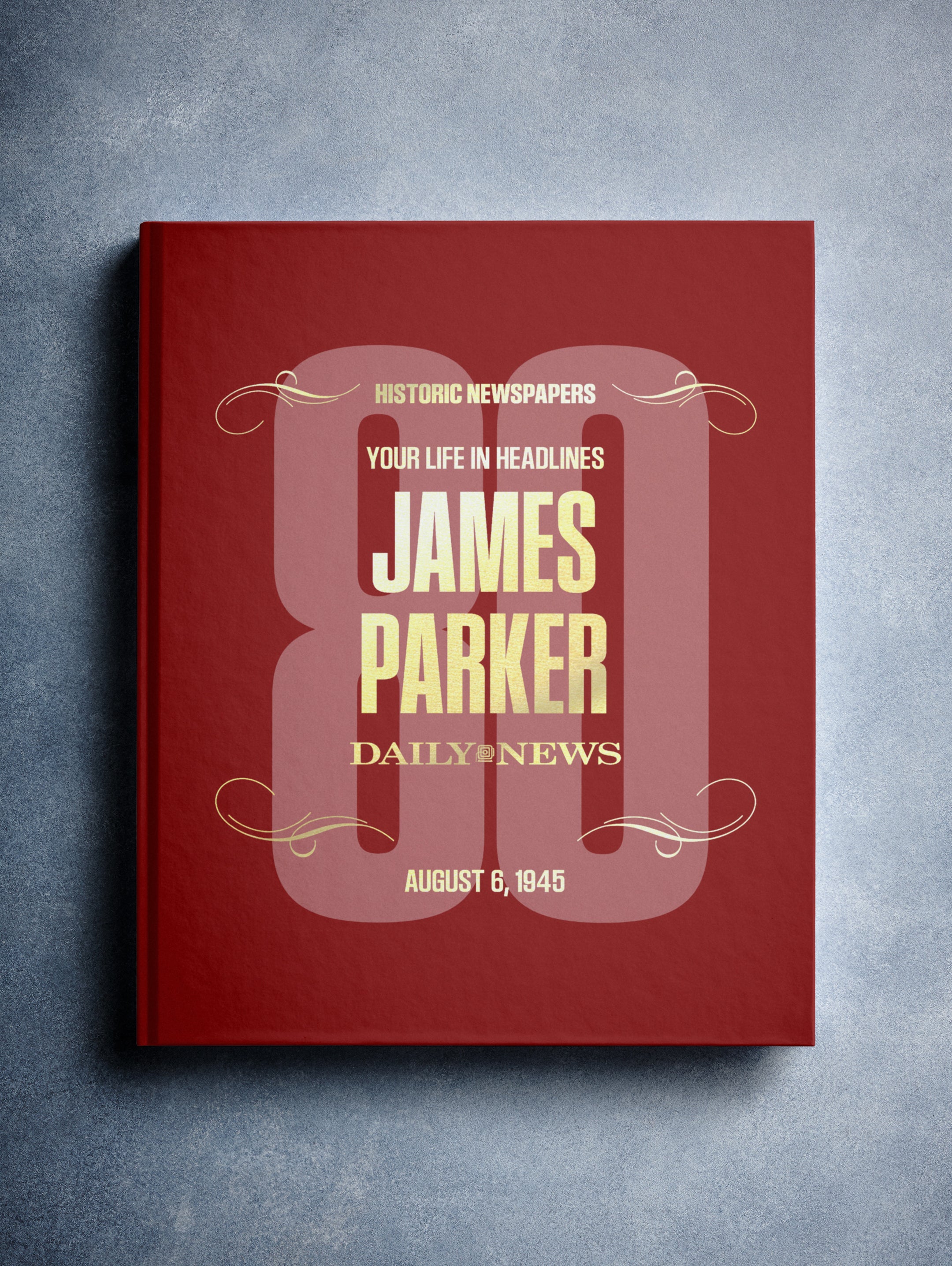 Personalized New York Daily News birthday newspaper book by Historic Newspapers with maroon foil cover and custom name inscription.