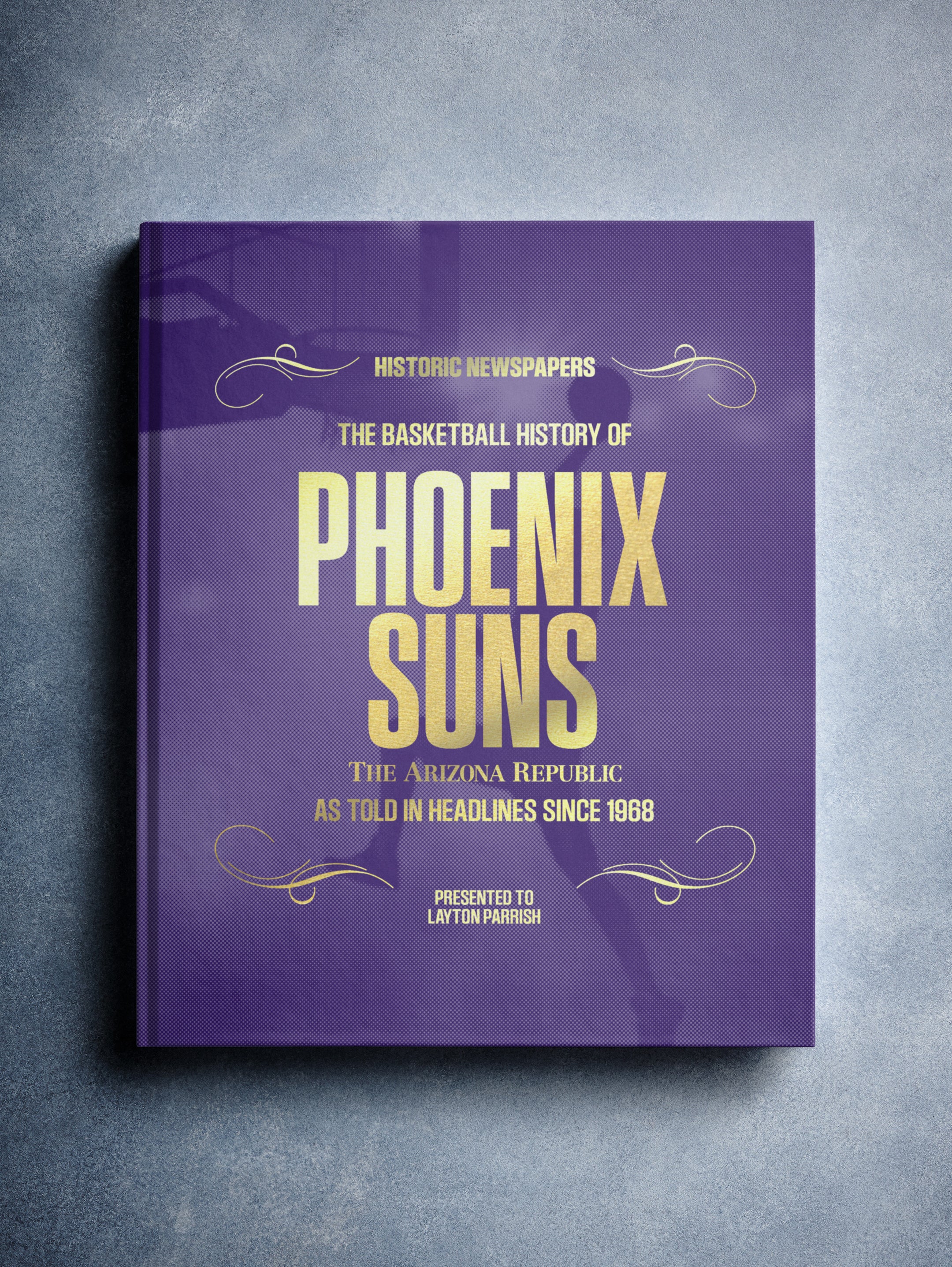 Foil image of "The Basketball History of Phoenix Suns" POD book by Historic Newspapers with purple basketball-themed cover.