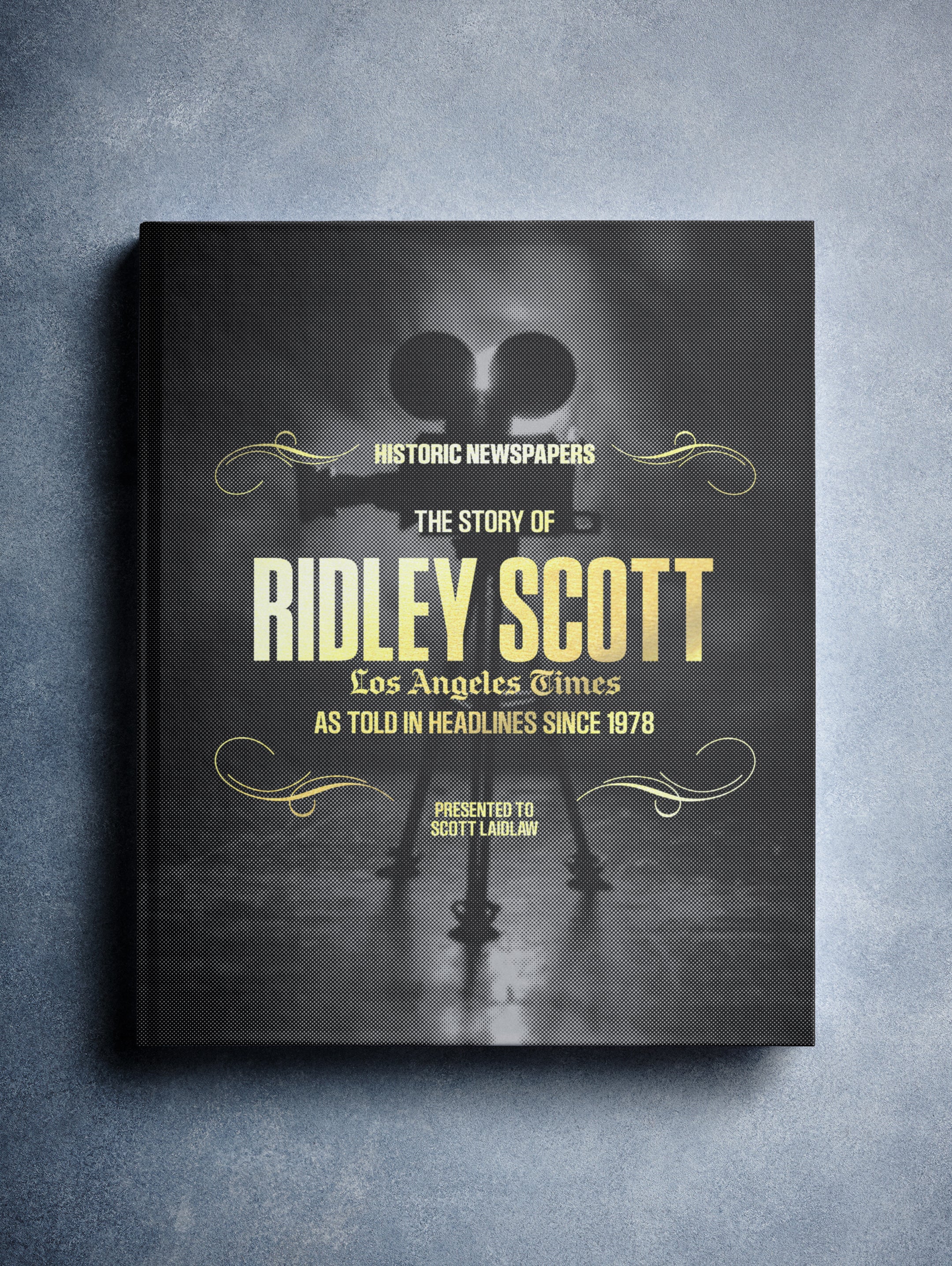 Black foil-covered POD book titled "The Story of Ridley Scott" by Historic Newspapers, featuring a Los Angeles Times edition cover.