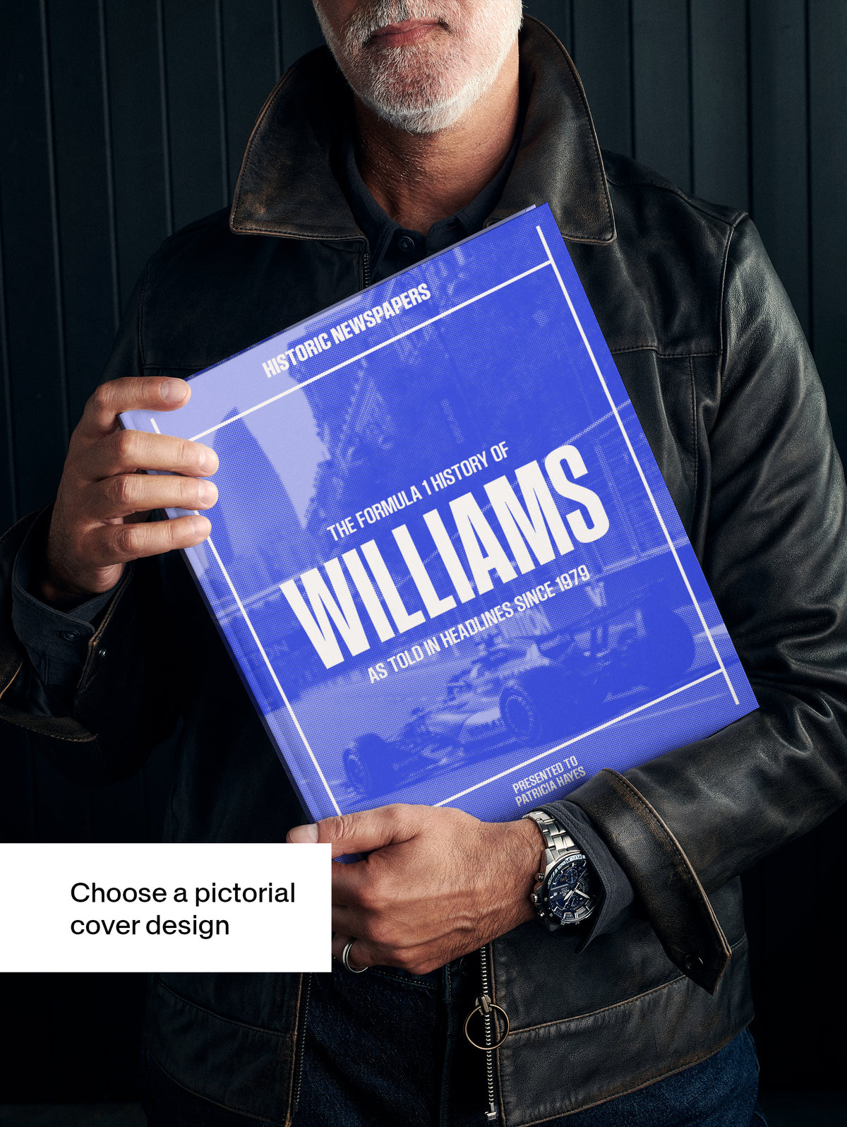 Open copy of The Formula 1 History of Williams POD book by Historic Newspapers featuring a blue cover and vintage Williams F1 images.