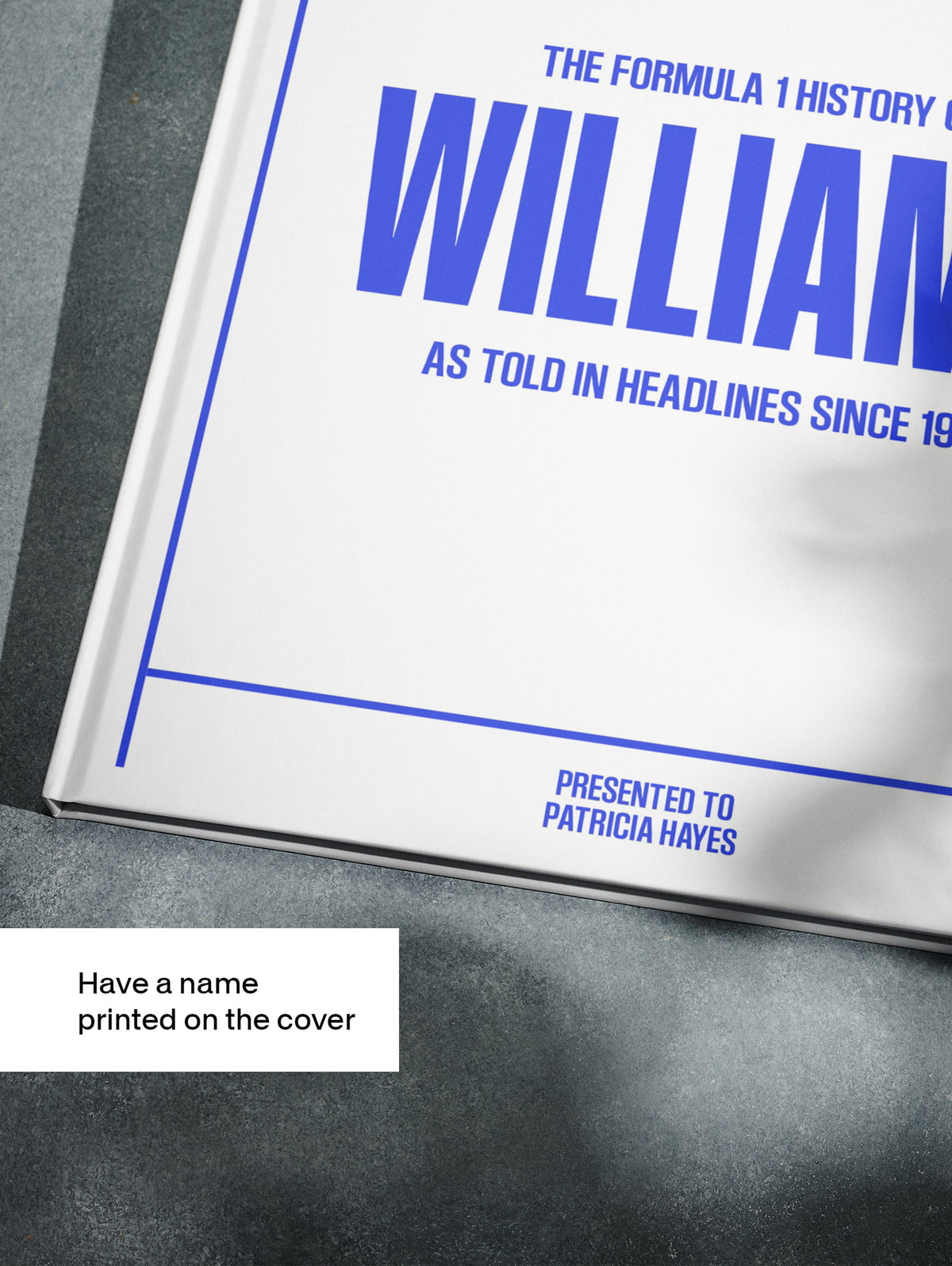 Close-up of "The Formula 1 History of Williams" POD book by Historic Newspapers on a white background, showcasing the cover design.