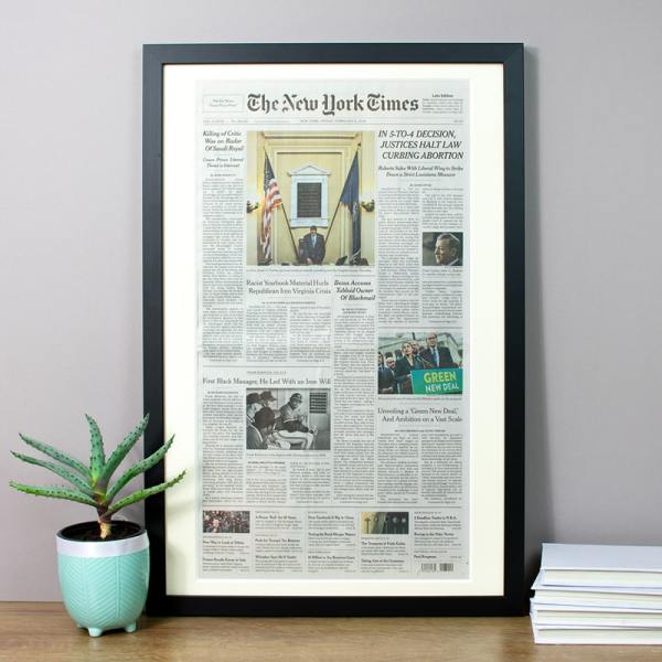 Framed newspaper